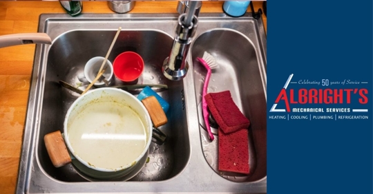 sink full of dirty dishes